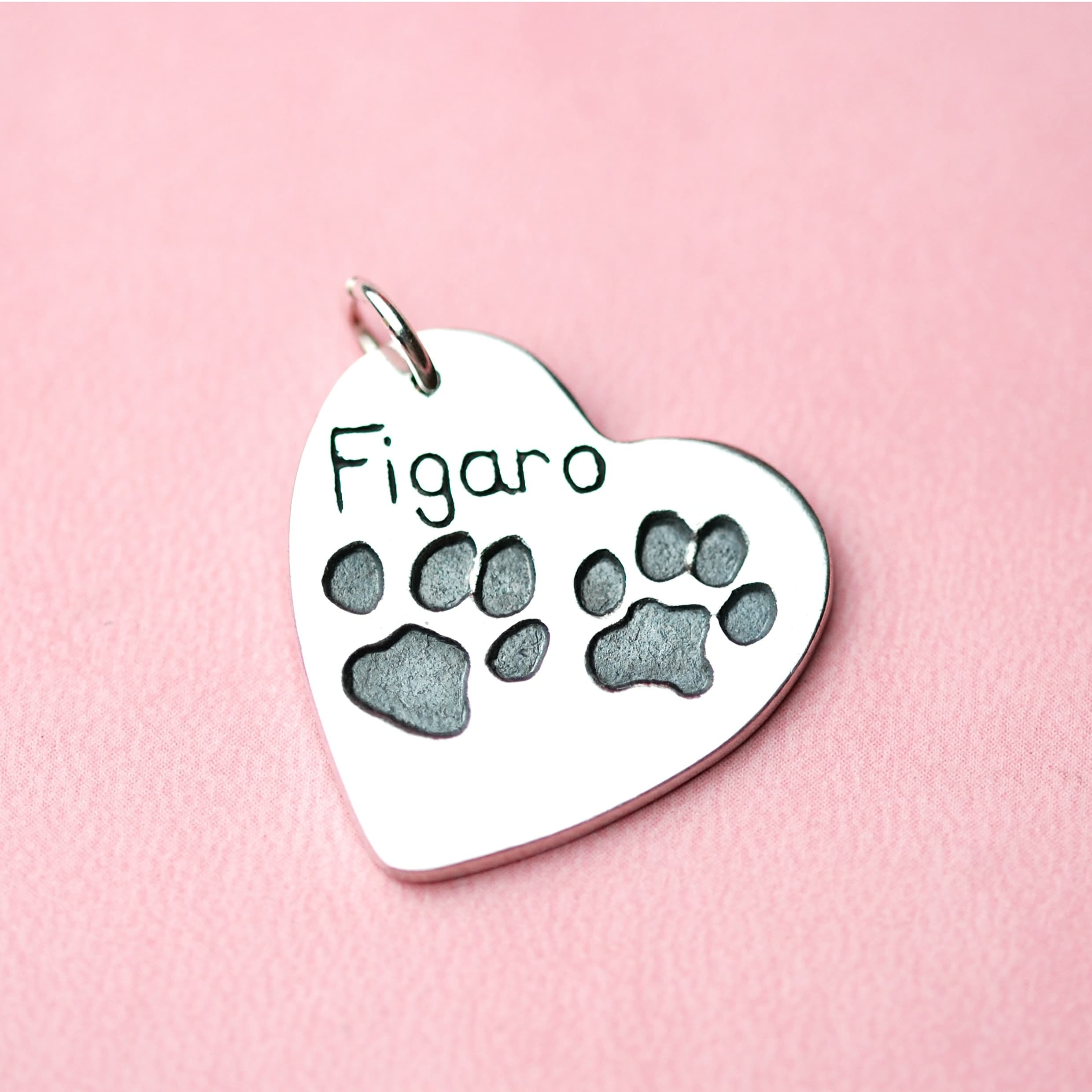 Large silver heart with your pet's unique paw prints and names