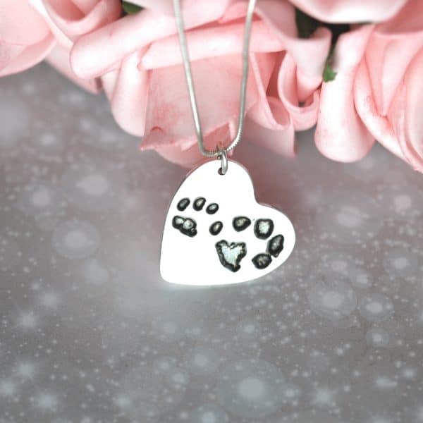 Large silver heart with your pet's unique paw prints and names