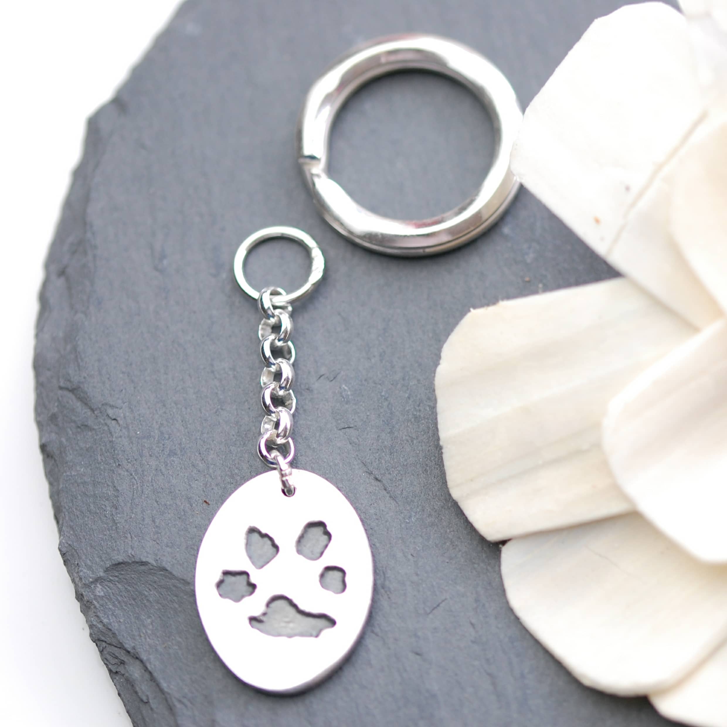Sterling silver oval keyring showcasing your pet's unique paw print