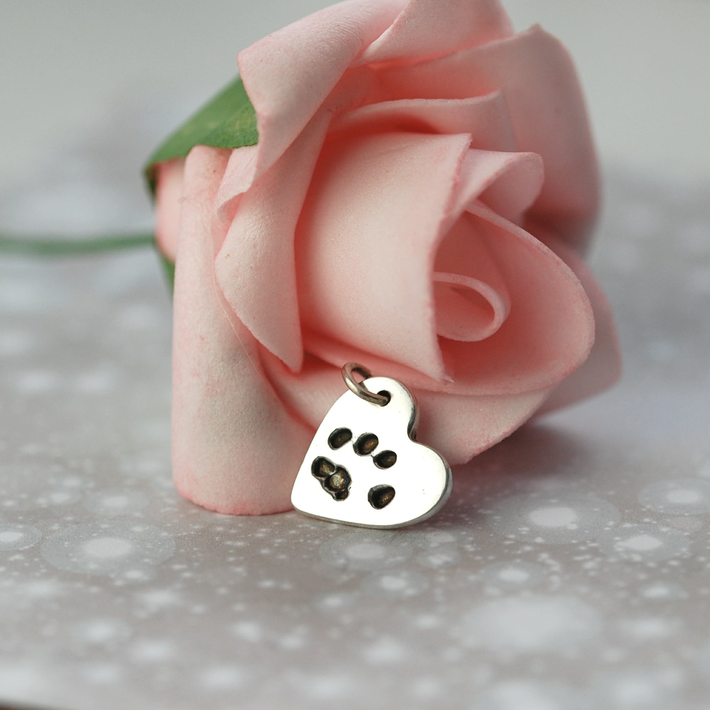 Small sterling silver heart with your pet's unique paw print and name