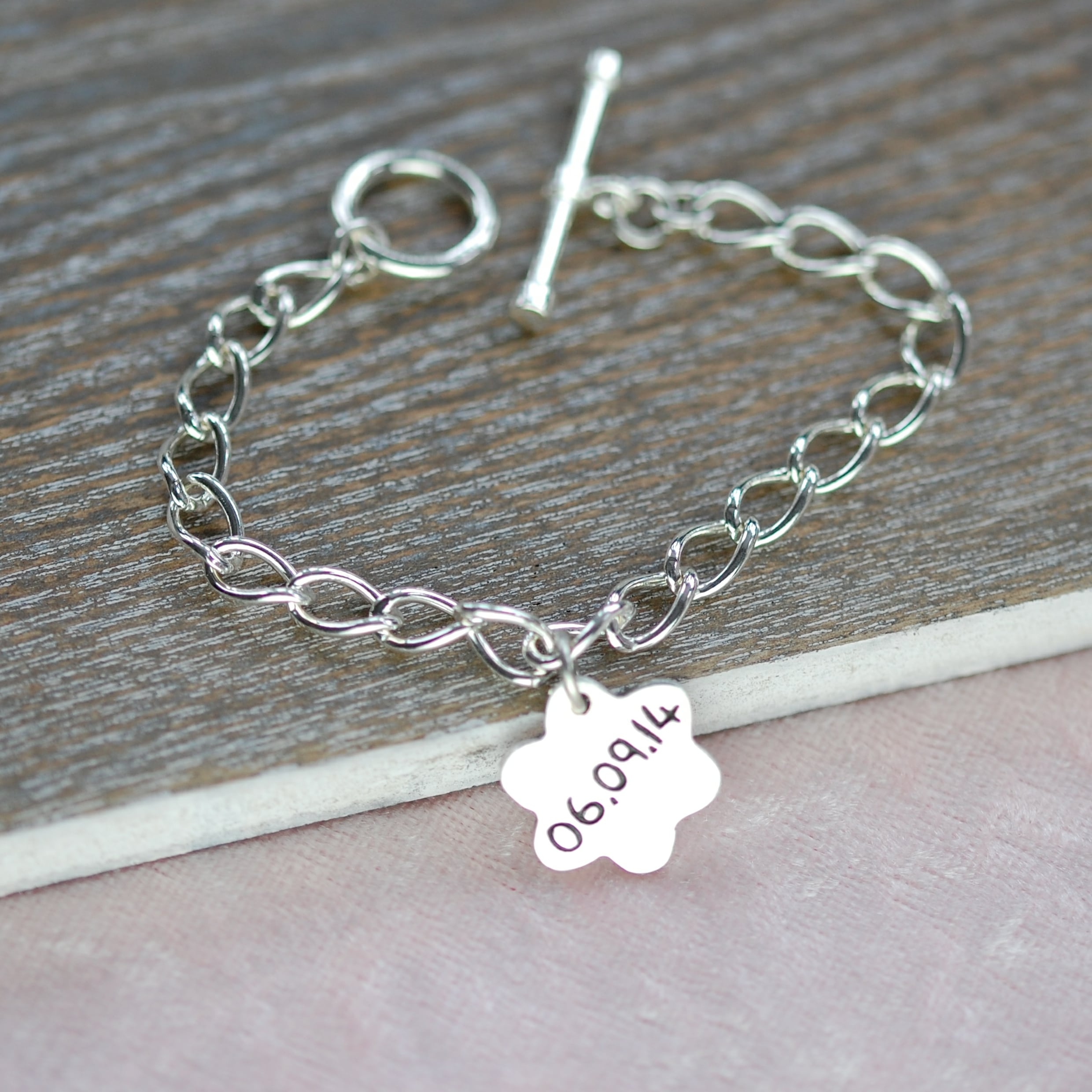 Small sterling silver charm with special date