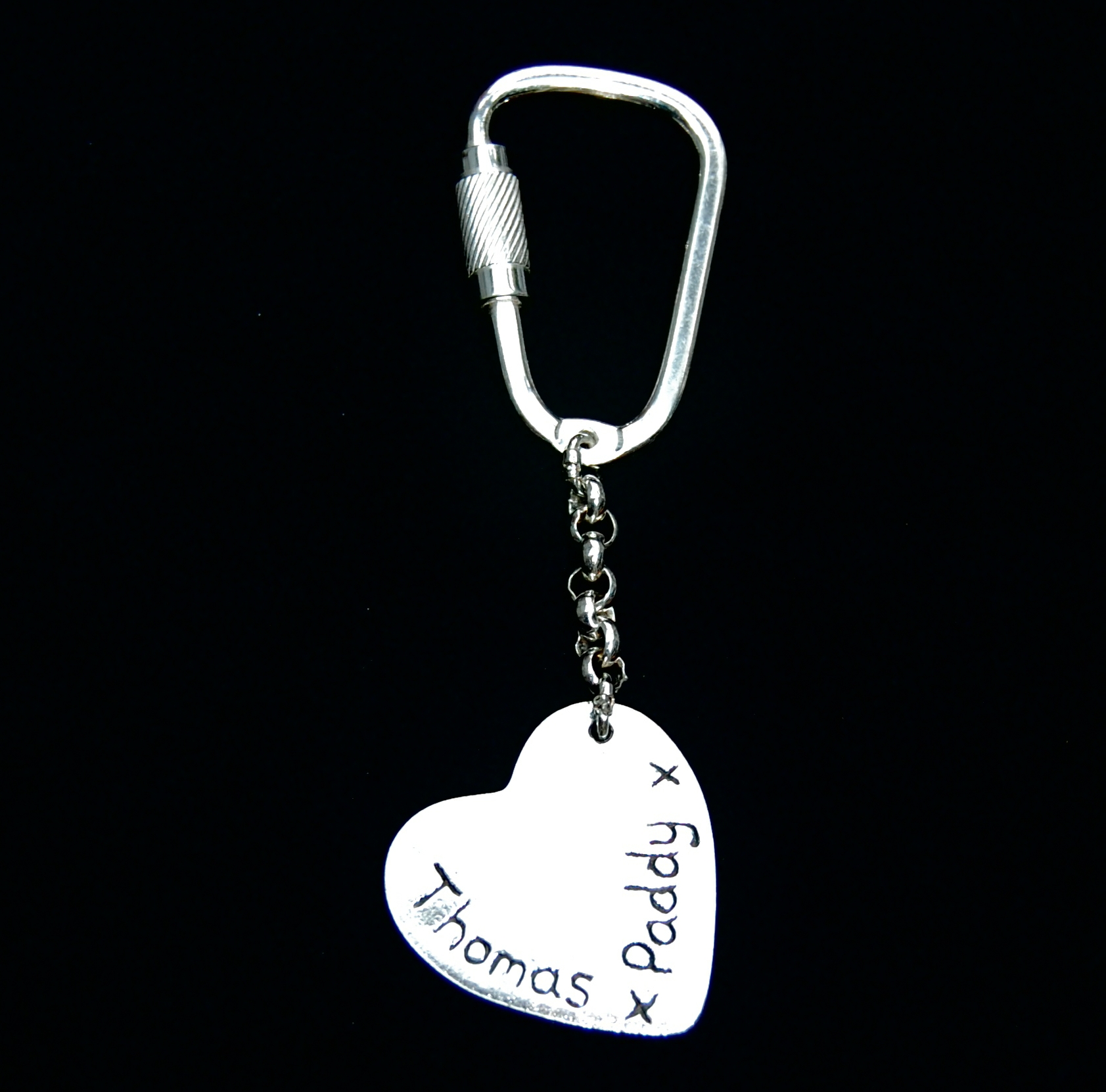Inscription on the back of a heart shaped silver keyring.