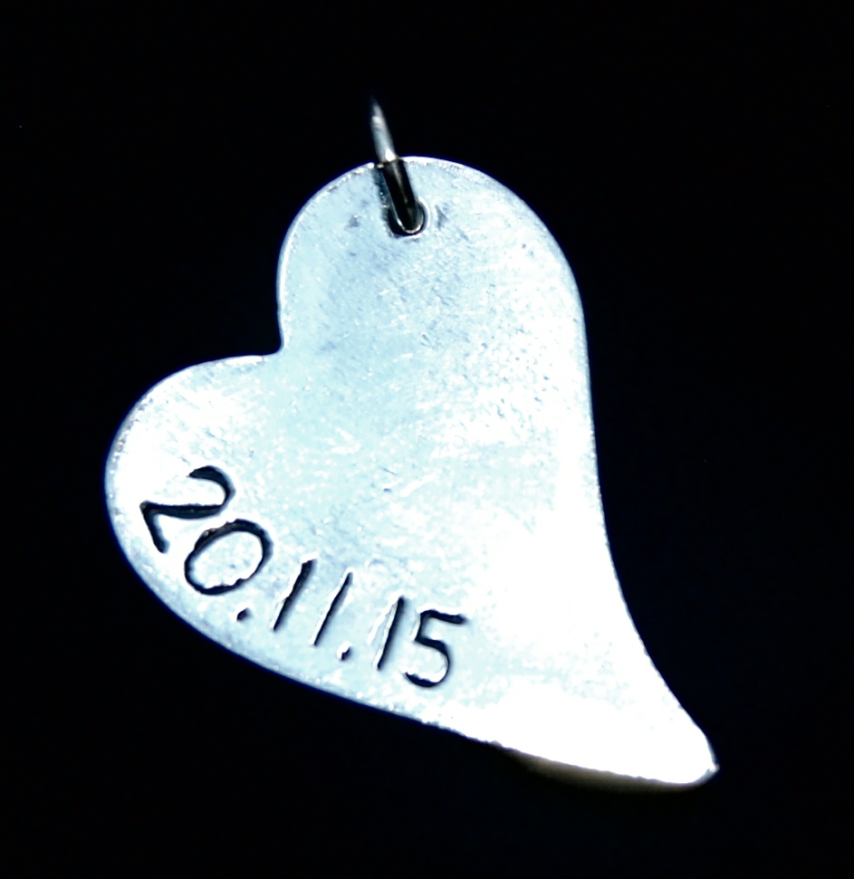 Add your own special date or message hand inscribed on the back of your charm.