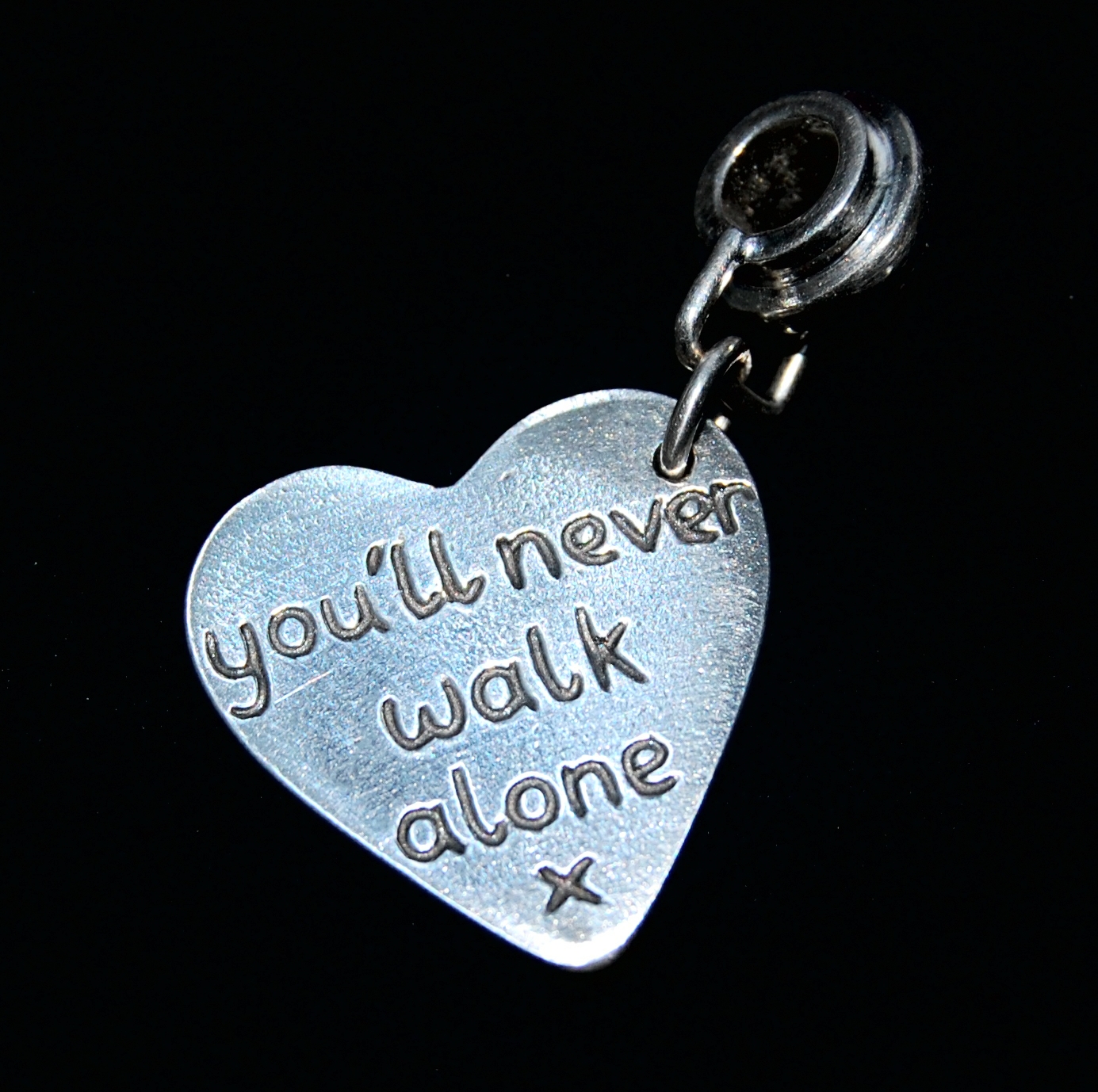 Capture your special message on the back of your charm.