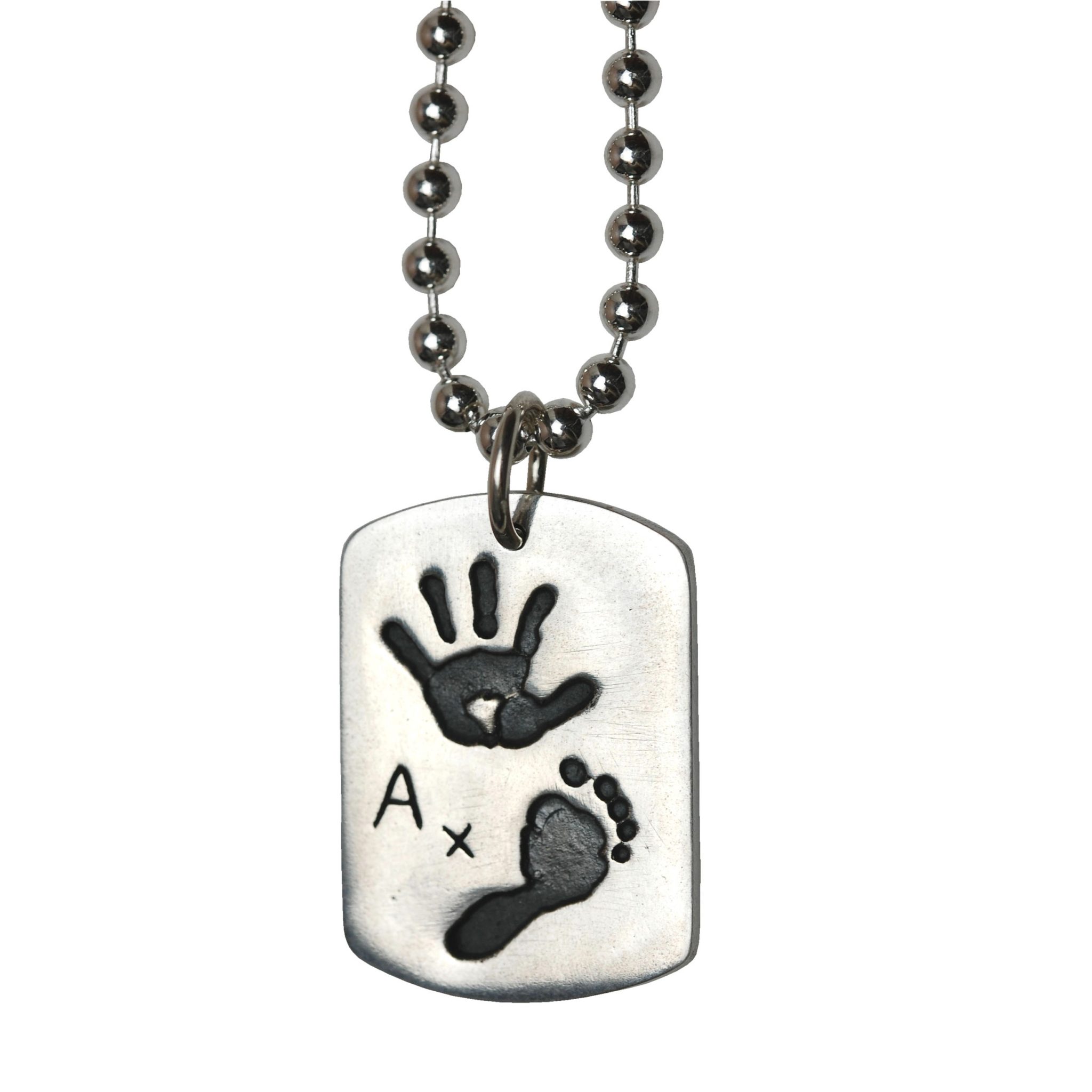 Large silver dog tag with hand and footprint on a silver ball chain