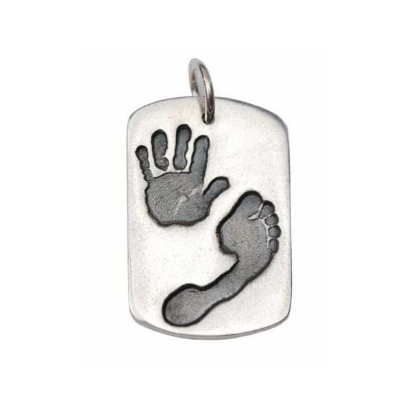 Large silver dog tag with hand and footprint