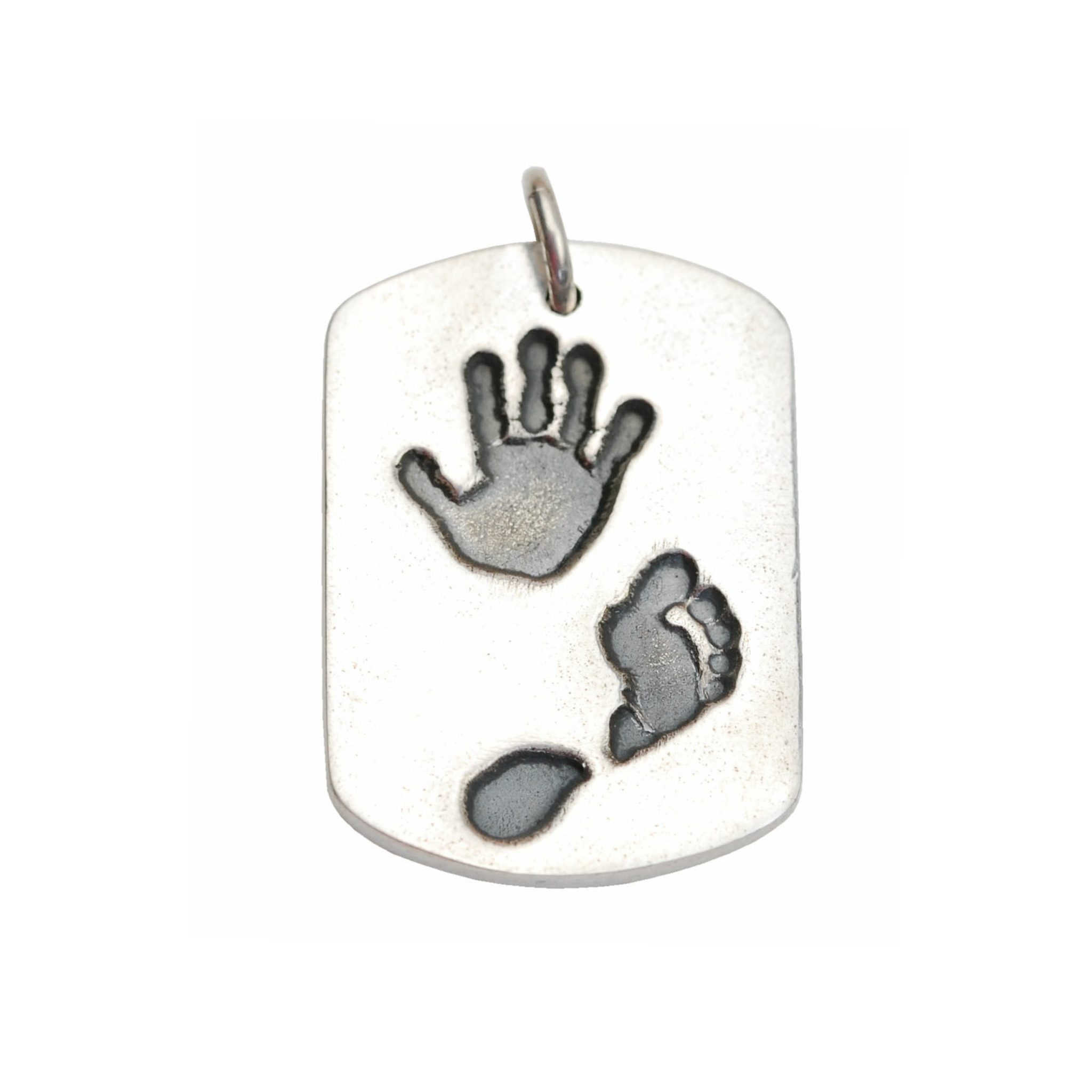Large silver dog tag with hand and footprint