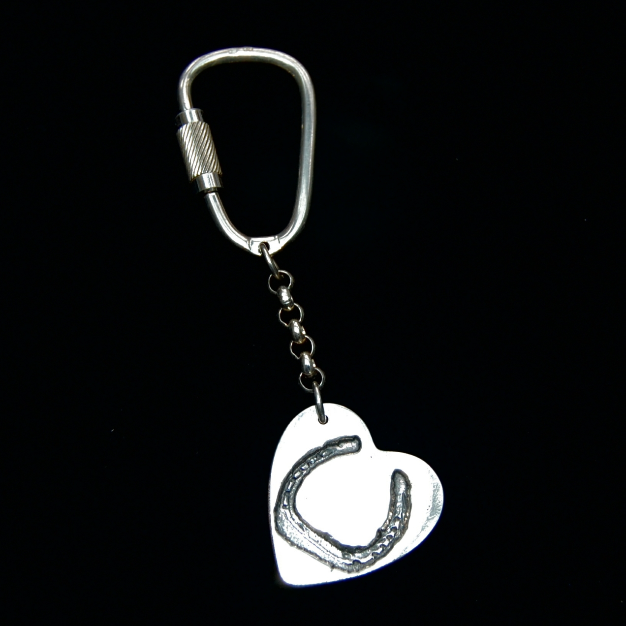 Large silver heart keyring featuring your own horse's unique shoe imprint.