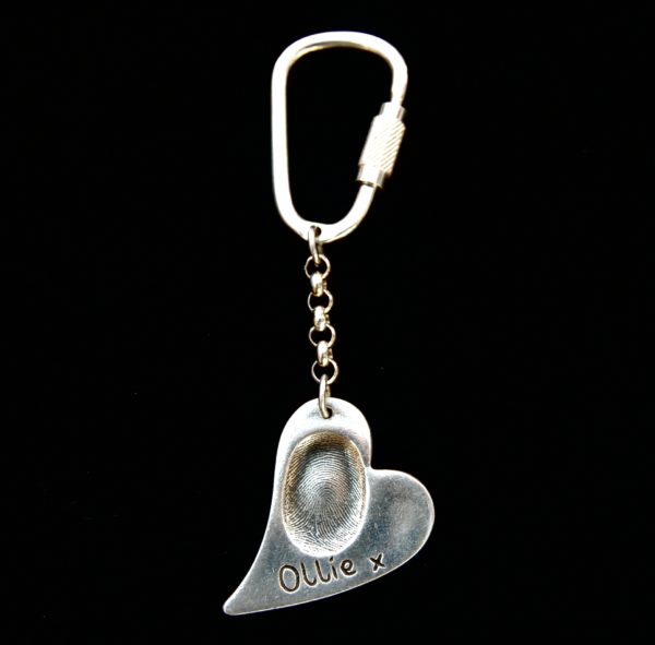 Large curved heart shaped silver fingerprint keyring with sterling silver keyring attachment.