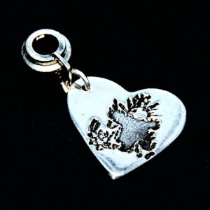 Regular silver heart charm featuring your child's precious drawing or loved one's handwriting. Presented on a charm carrier ready to add to your bracelet.