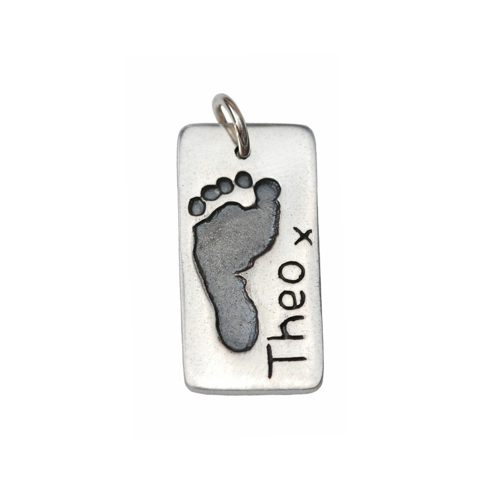 Silver rectangle charm with footprint