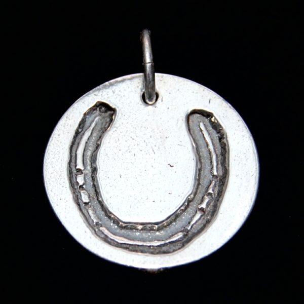 Regular silver circle charm showcasing your horse's unique shoe imprint.