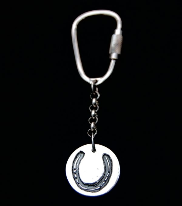 Regular silver circle keyring with your horse's unique shoe imprint.