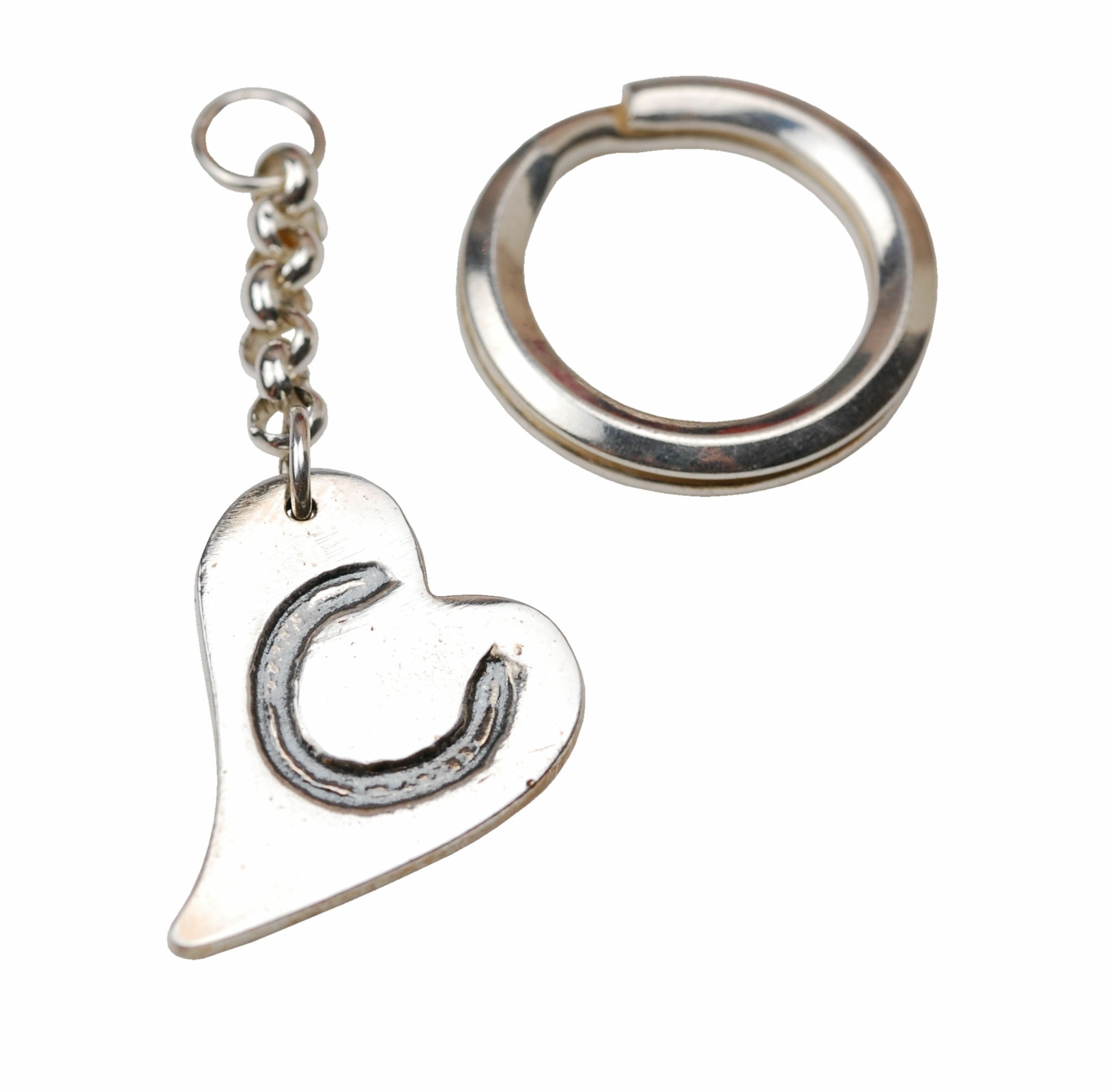 Silver curved heart keyring with horse shoe