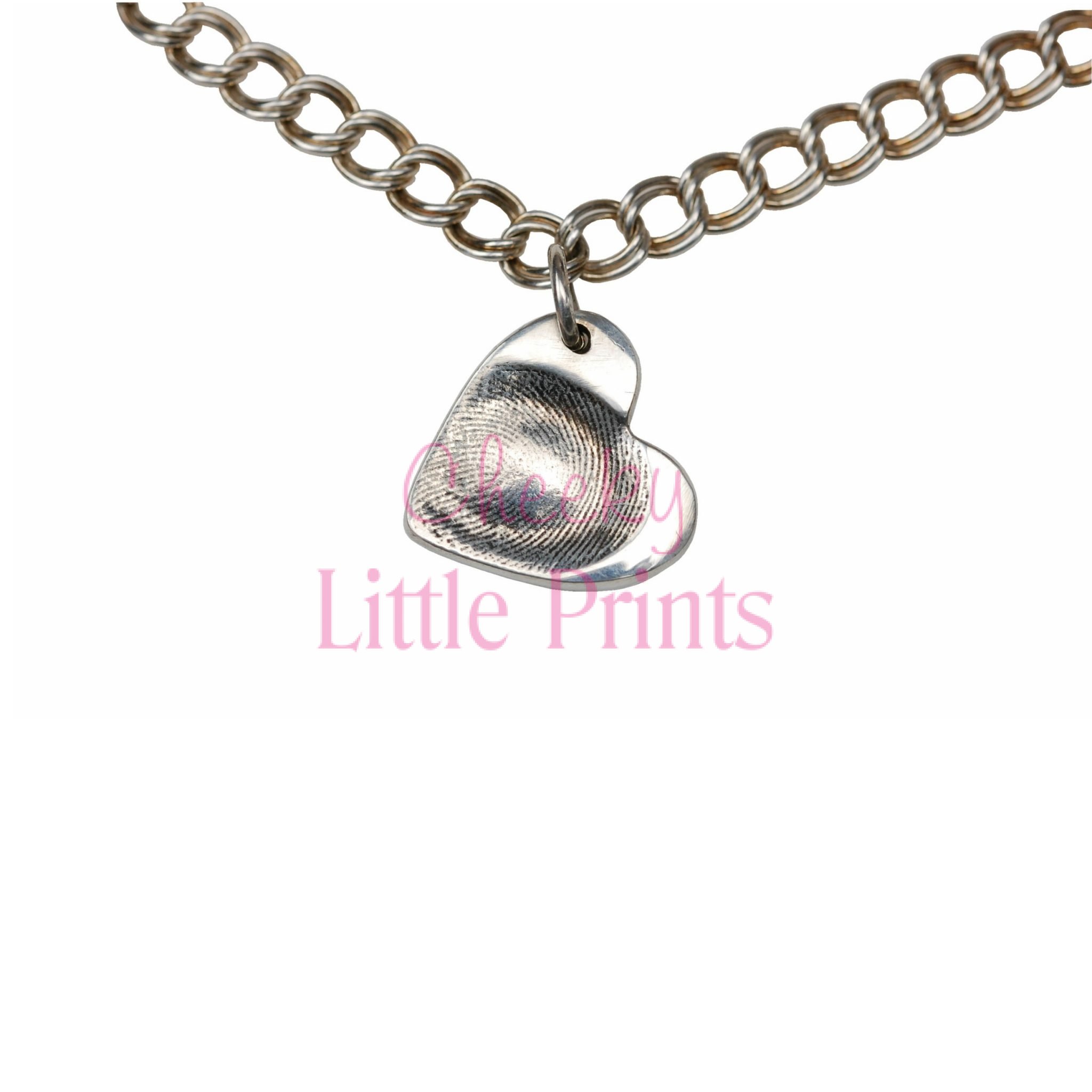 Small silver heart charm with fingerprint