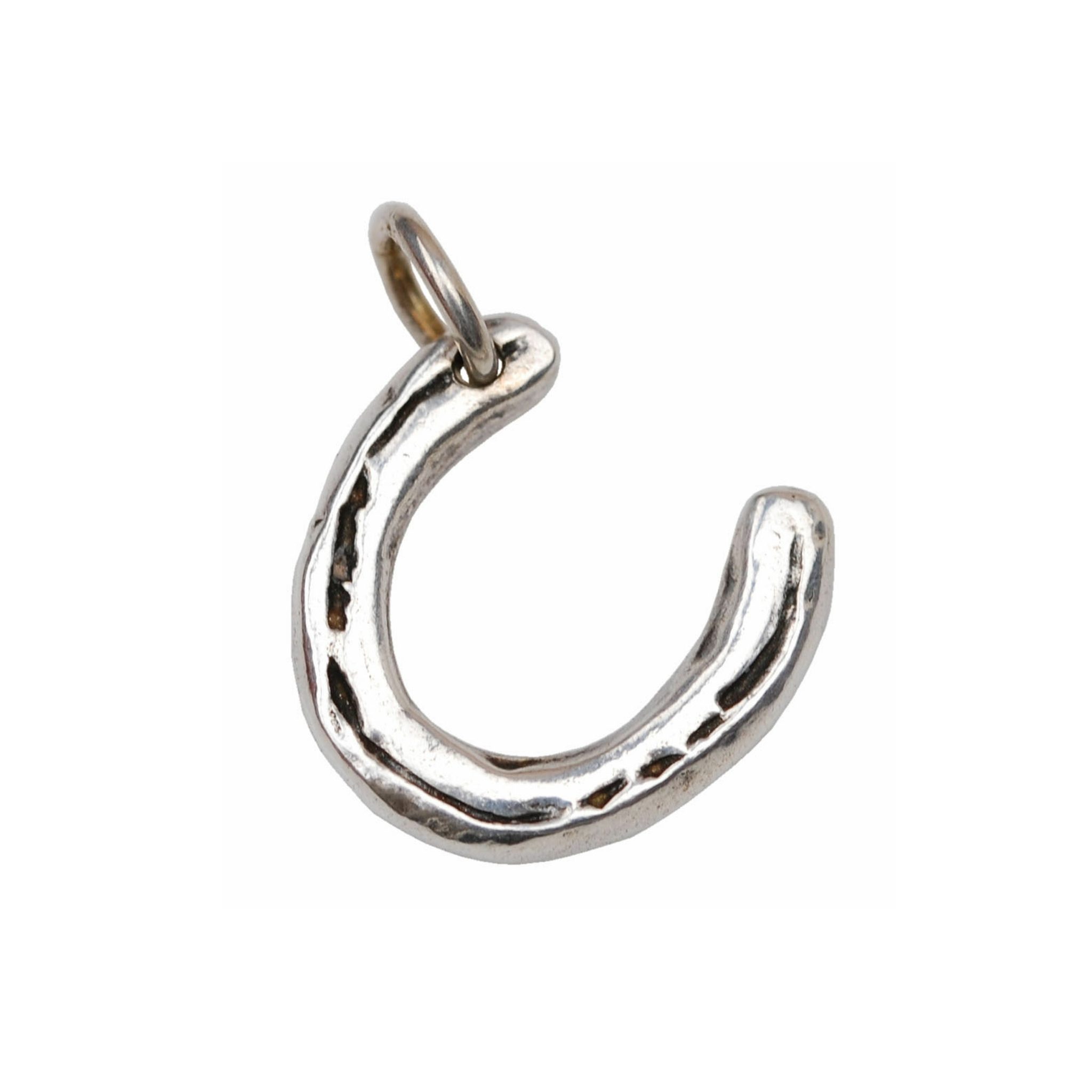 Silver charm with your horse's shoe.