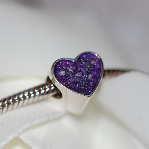 Silver heart charm bead with pet cremation ashes and violet colour