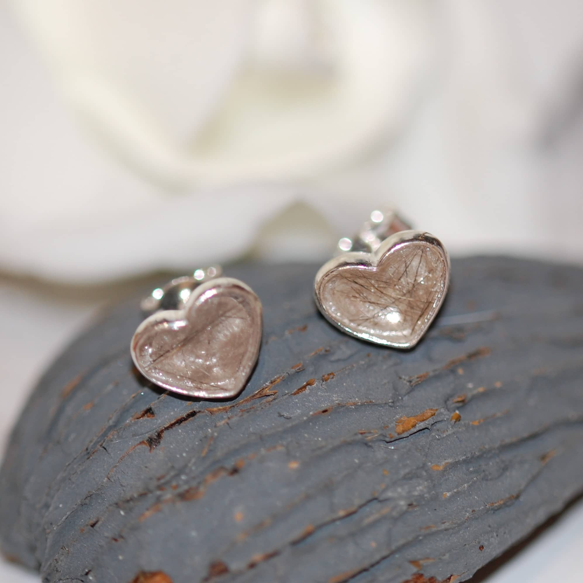 Silver heart stud earrings with pet fur or cremation ashes