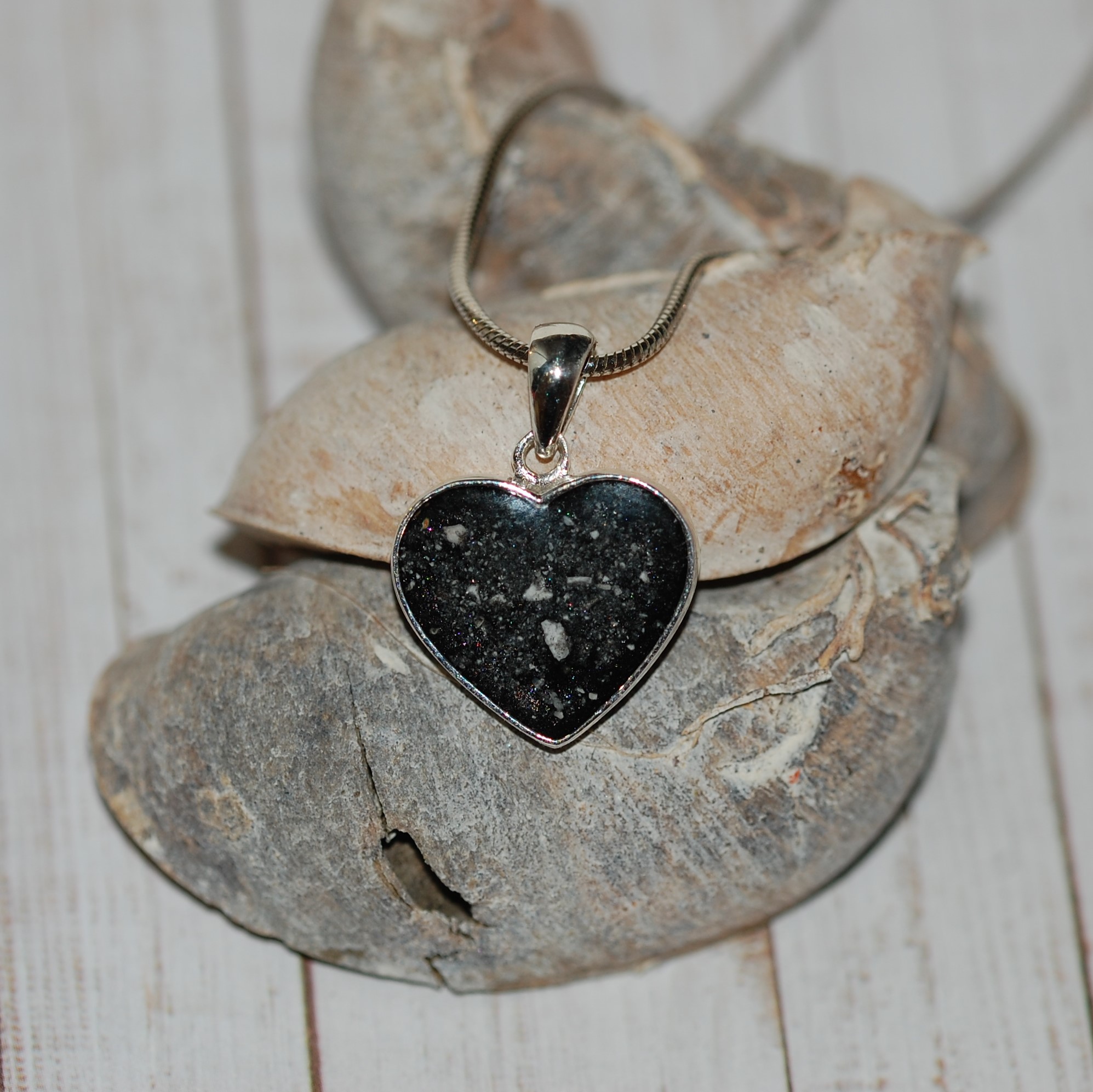 Silver heart pendant with pet cremation ashes and black pearl colour