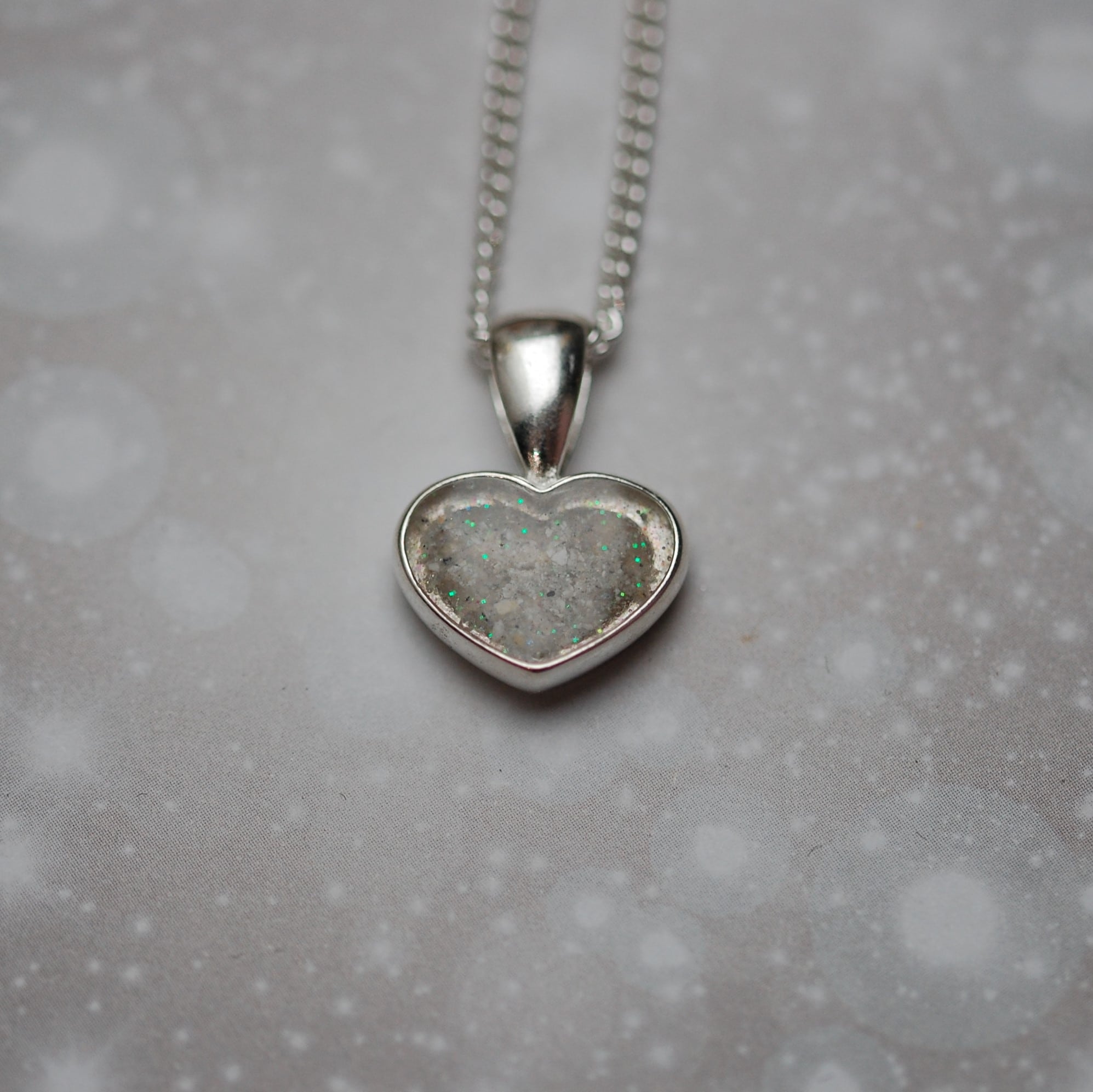 Small heart pendant with pet fur or cremation ashes