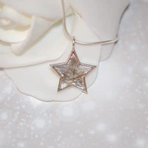 Silver star pendant with pet fur or cremation ashes