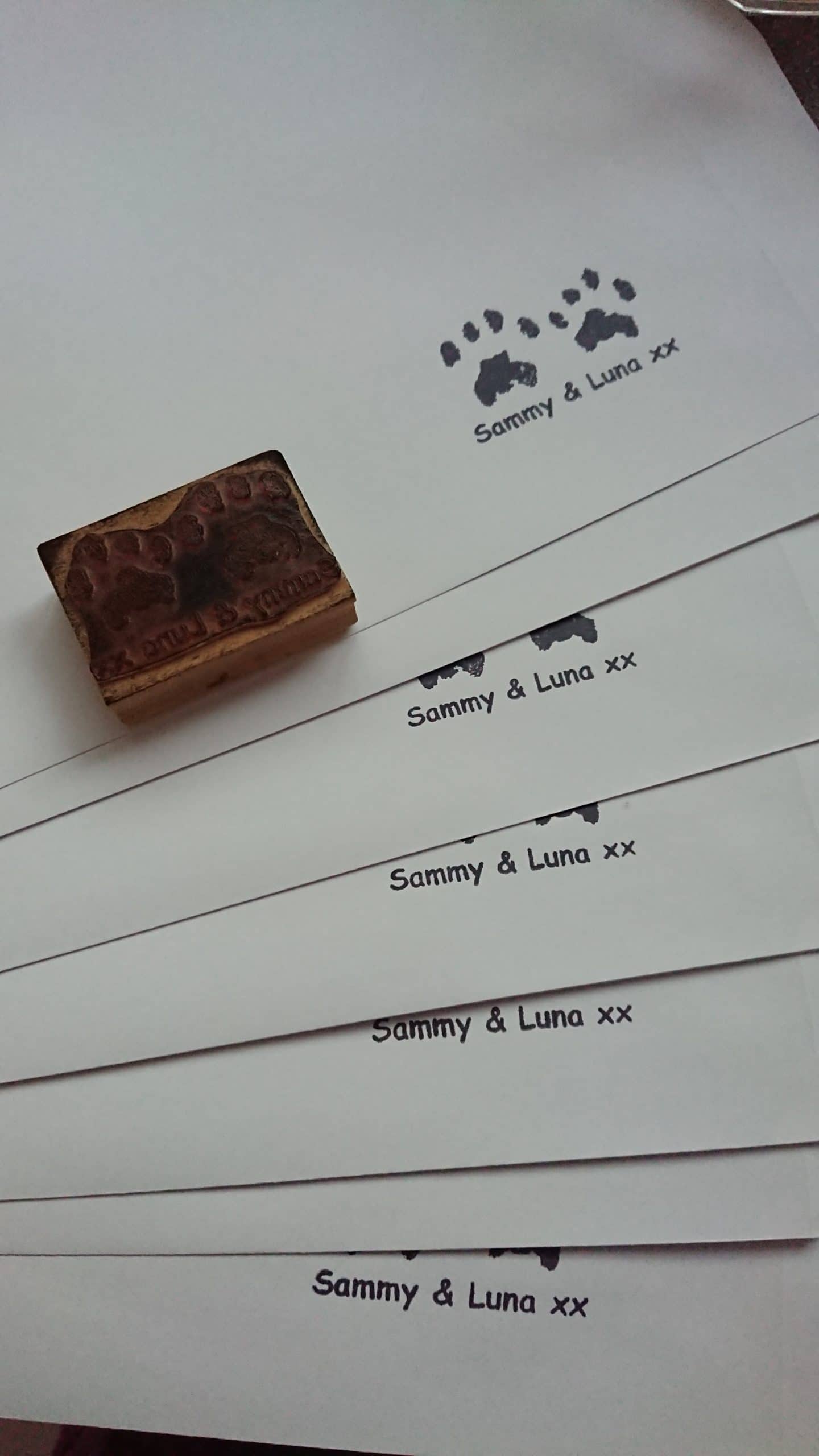 Envelopes with unique pet paw print stamp