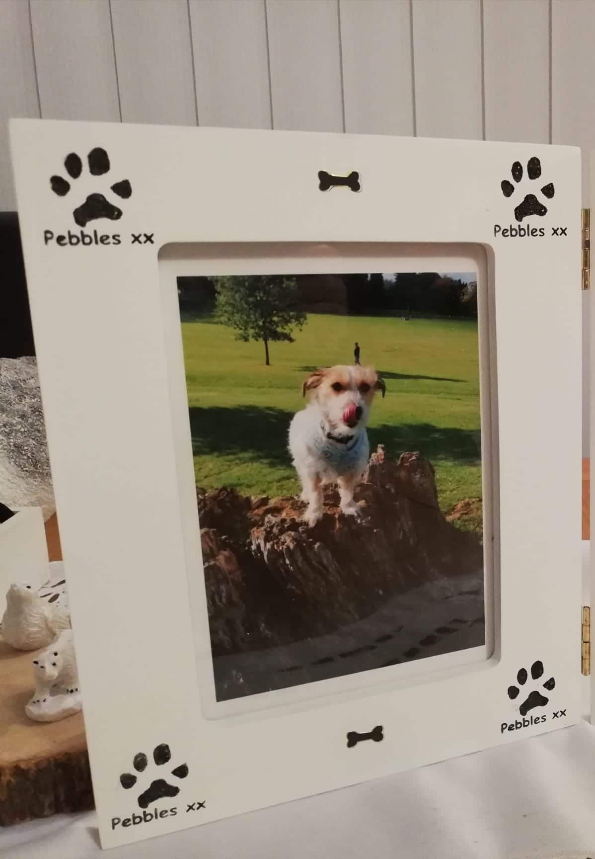 Photo frame decorated with personalised dog paw print stamp
