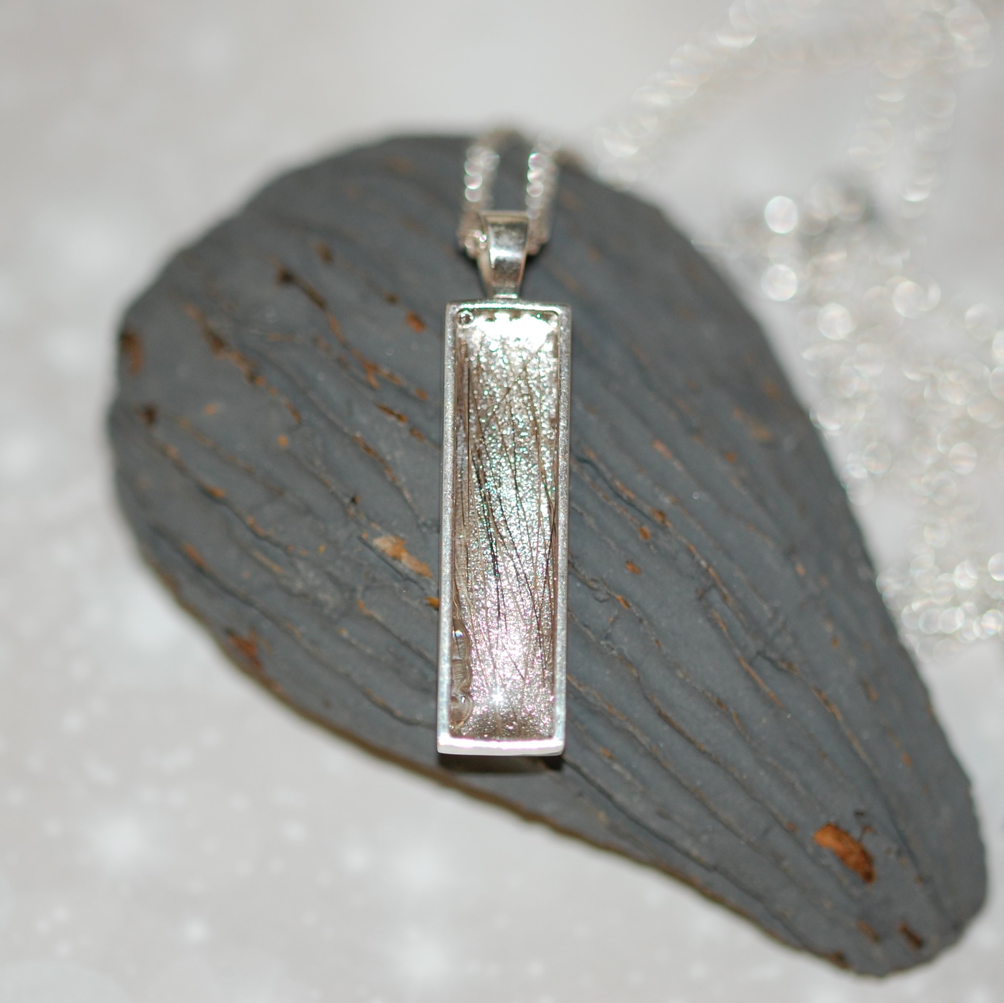 Silver rectangle pendant with pet fur encased in resin