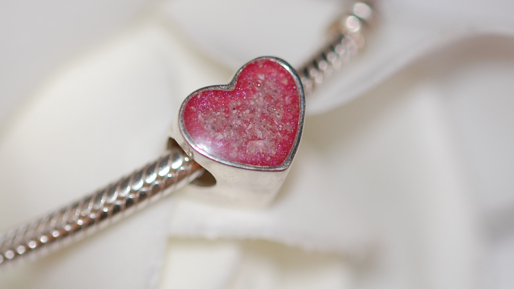 Silver heart charm bead with pet cremation ashes